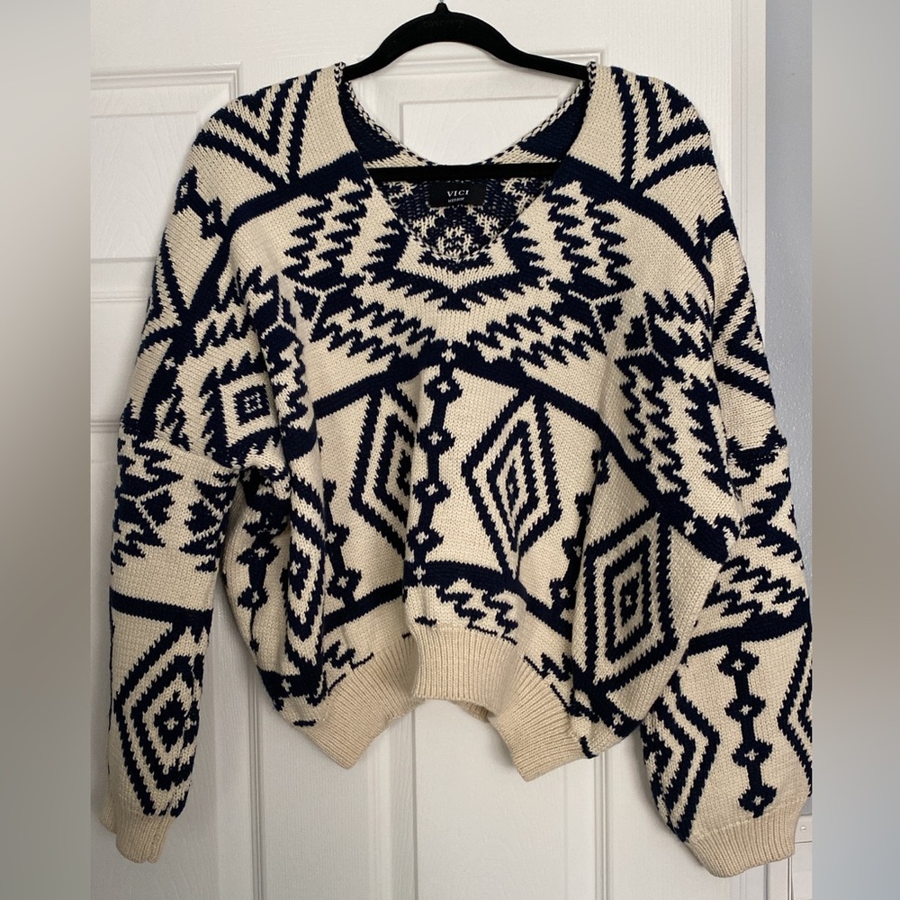 Navy blue and cream sweater